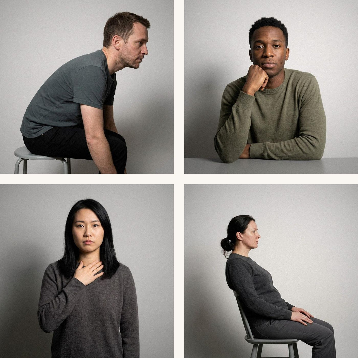 Four people around a table, each reacting differently to what was just said